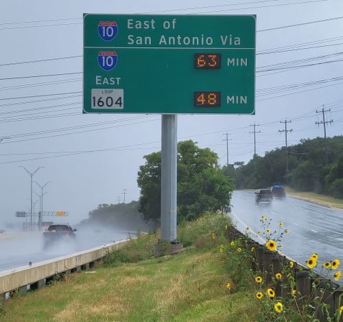 Travel time comparison sign photo